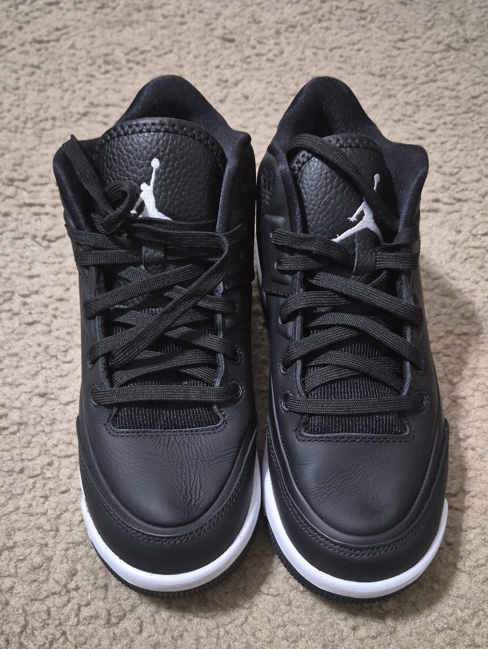 Jordan Black and White Low-Top Jumpman Sneakers